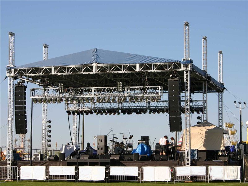 Stage lighting and LED screens at a night performance